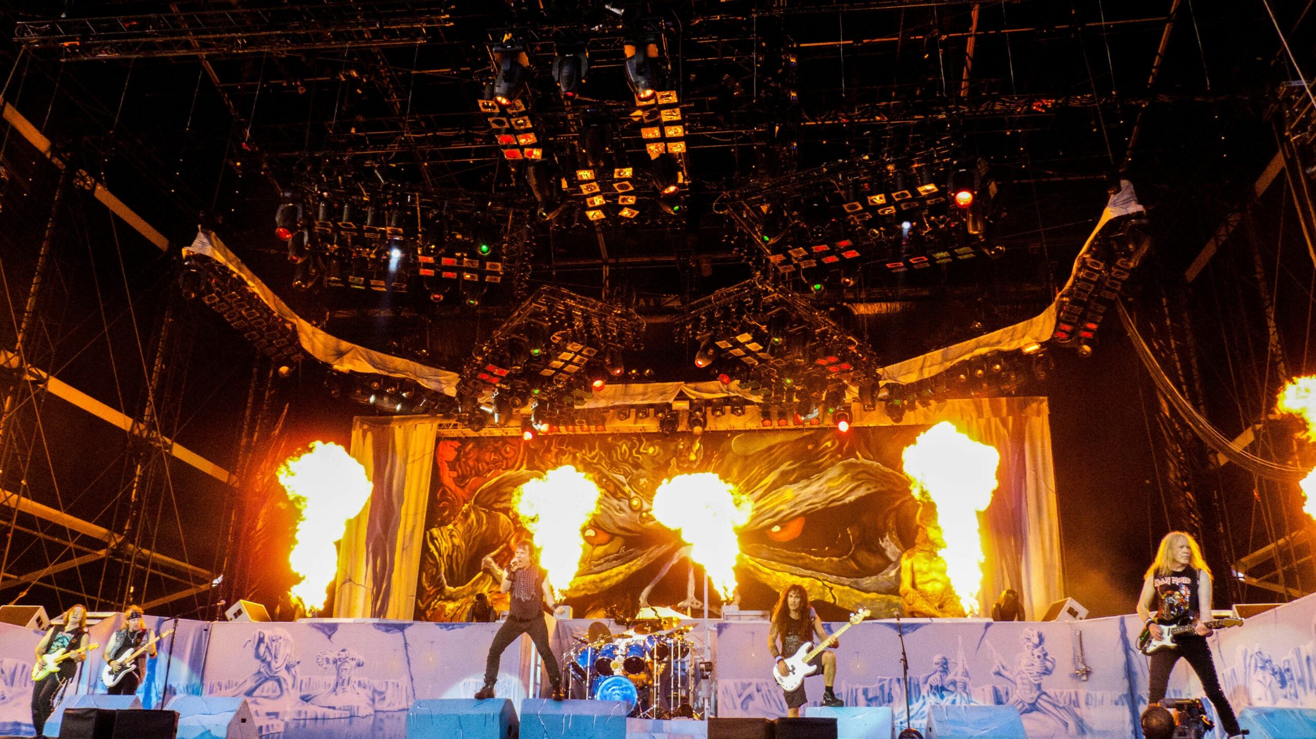 heavy metal rock band performing with pyrotechnics