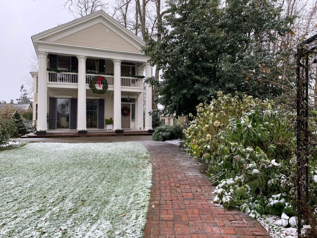 Ainsworth House with snow on the lawn