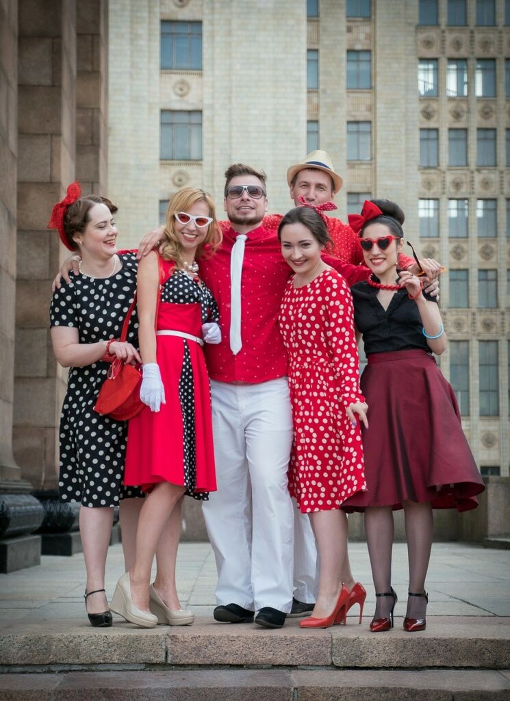 people in red and white polka dots