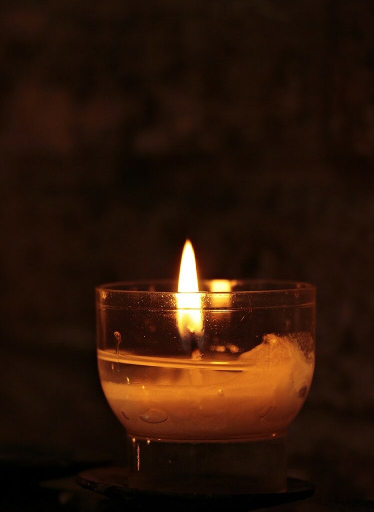 tea light candle with flame