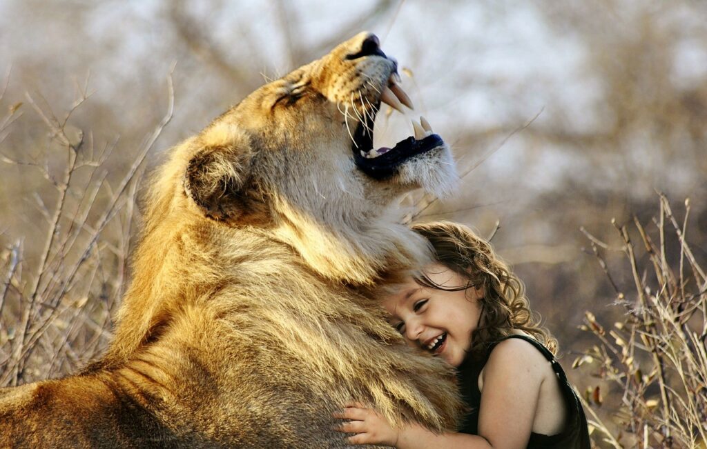 laughing girl and lion