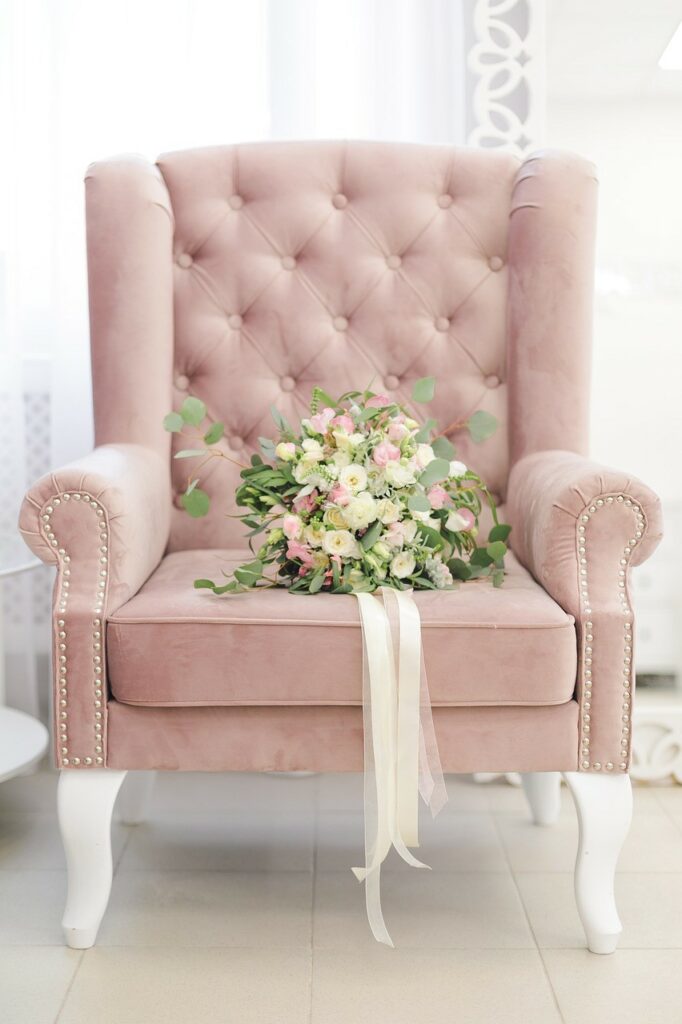 wedding chair with flower bouquet set on it