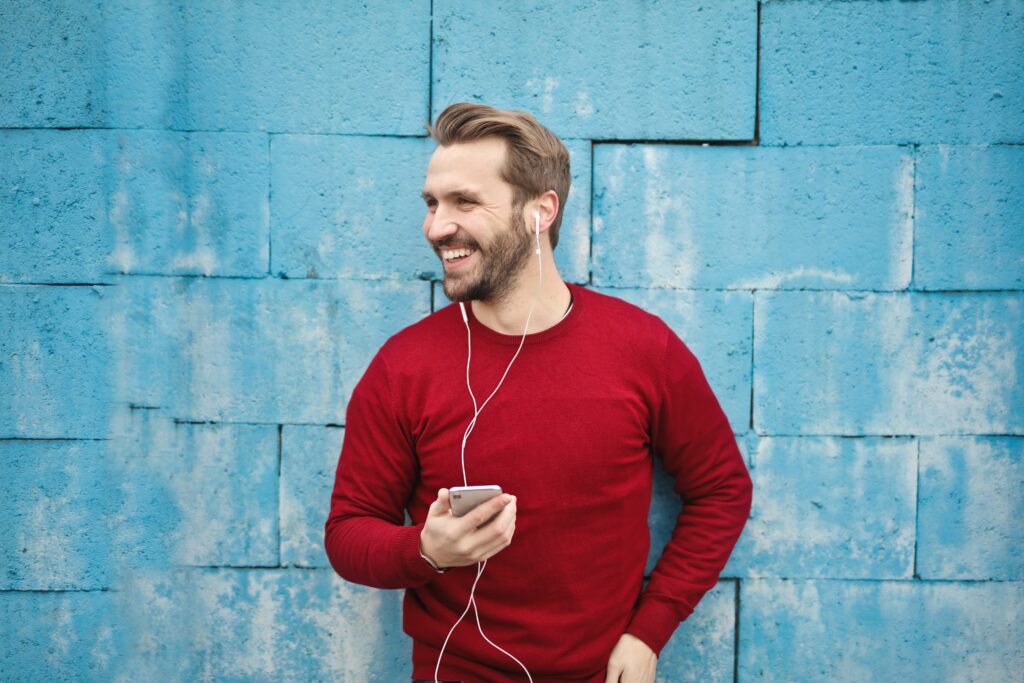 happy man in a red sweater