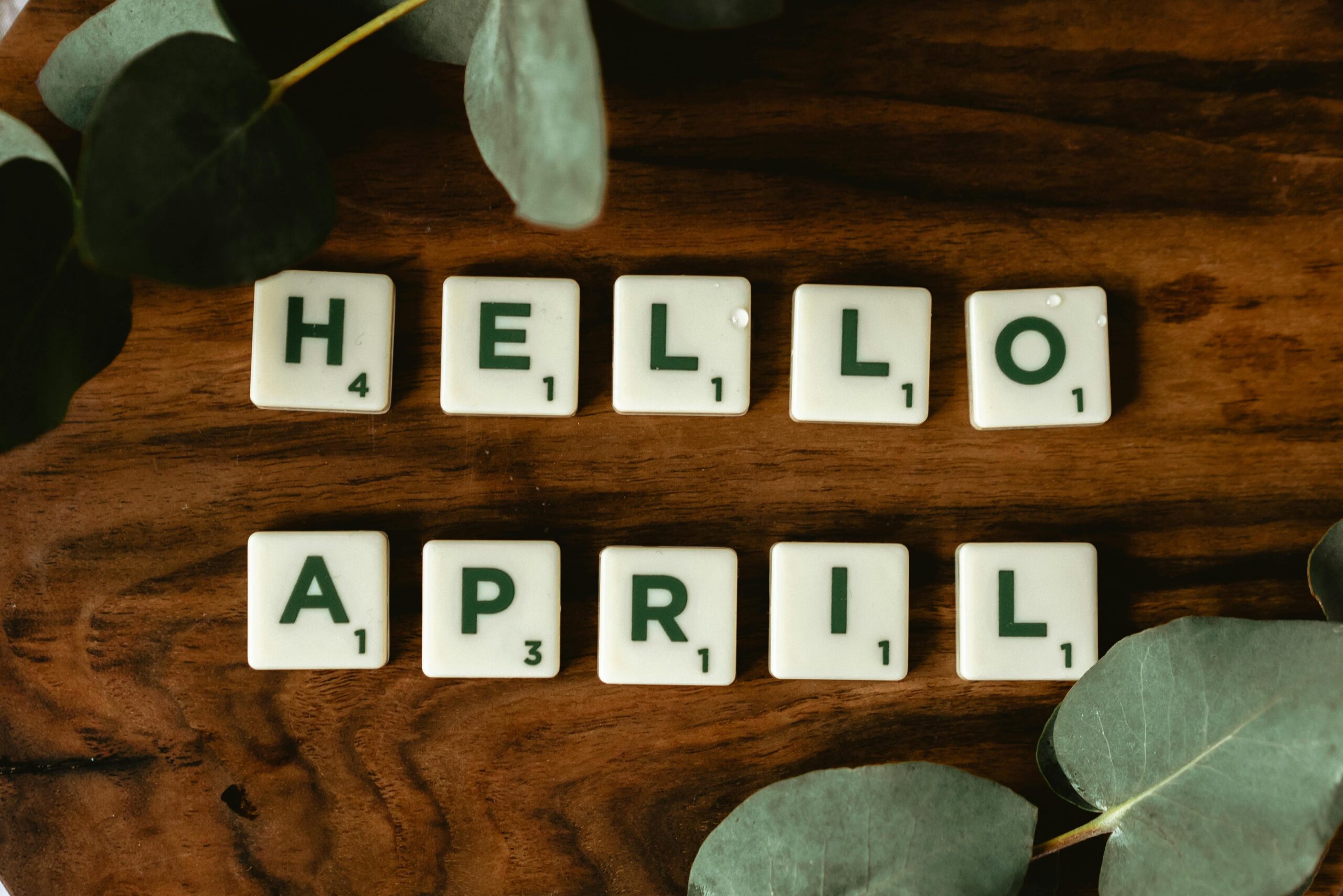 tile letters spell out "Hello April"