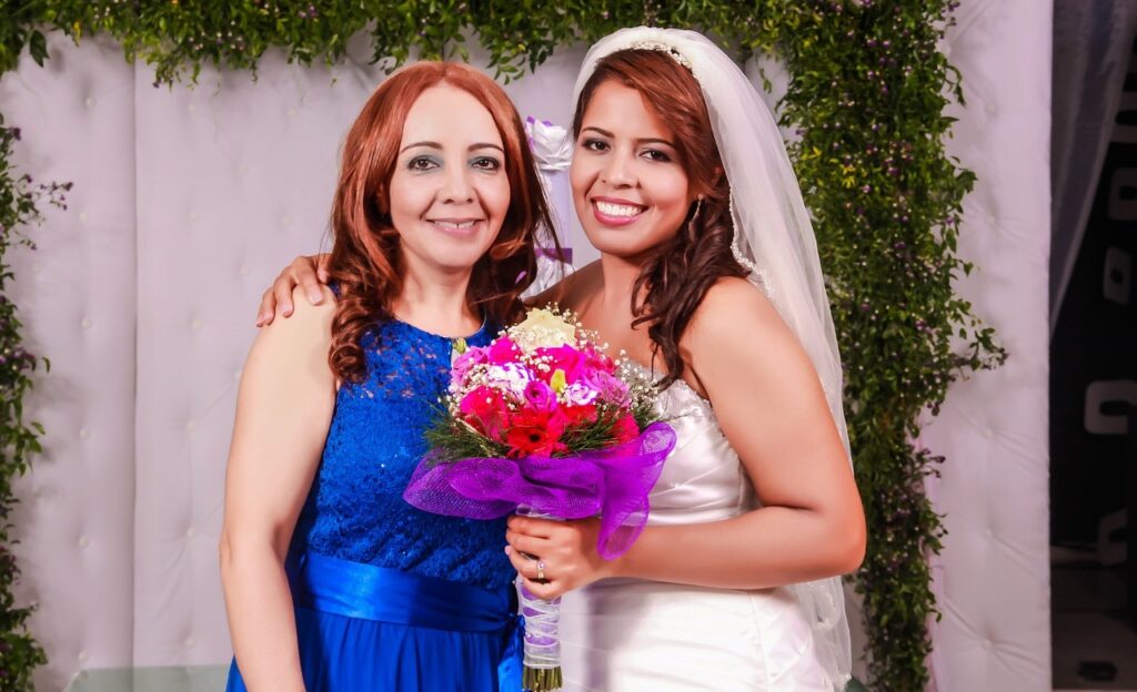 mother of the bride in blue and the bride