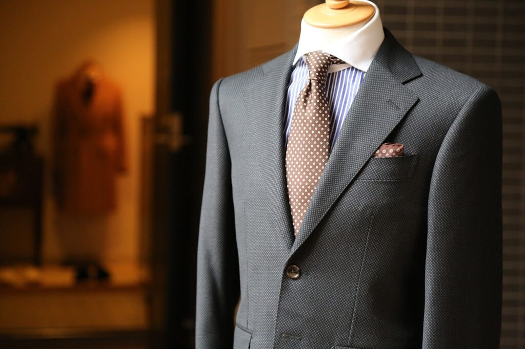 man in dark gray suit with matching tie and pocket square PXBY