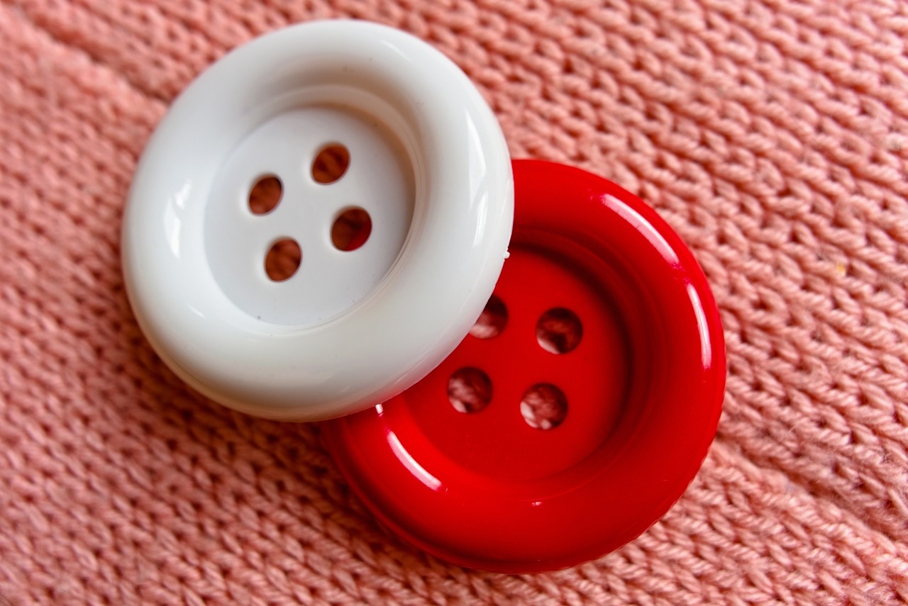 red and white round buttons Pixabay