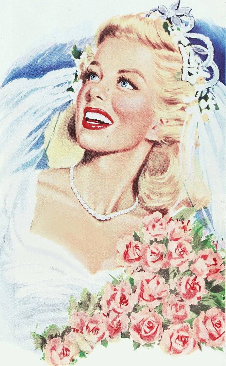 1940s bride wears a strand of white perls